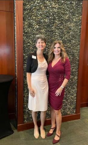 Picture of 2 board members of WCC St Pete COC