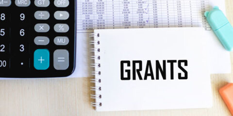 grant typed on a paper