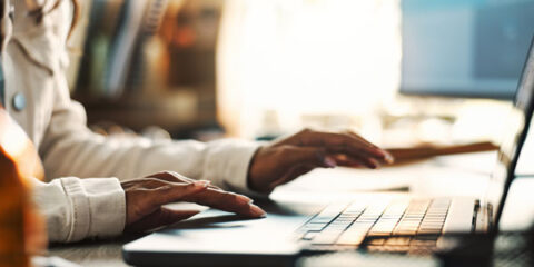 a person on a computer search information